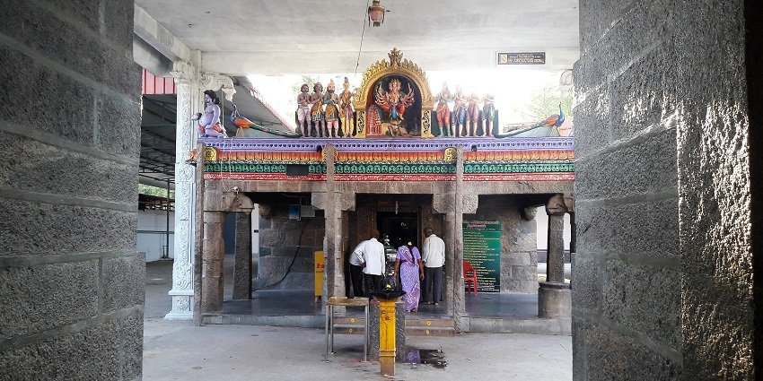 An inside view of the Vallimalai Murugan Temple devotees wait for their turn to pray.