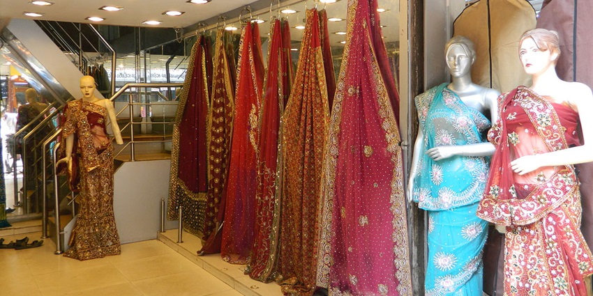 Saree shopping in Madurai boutique offering traditional and contemporary styles.