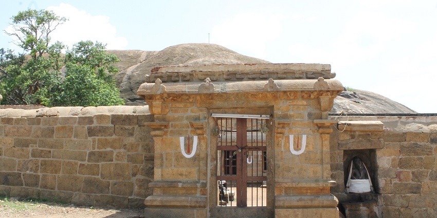 A distant view of one of the Sirkazhi temples that has intricate carvings and sculptures.