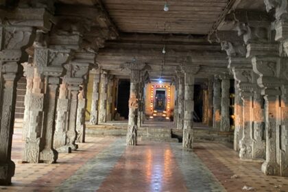 Thiruvaiyaru Temple halls with grand, carved pillars and ancient stone structures.