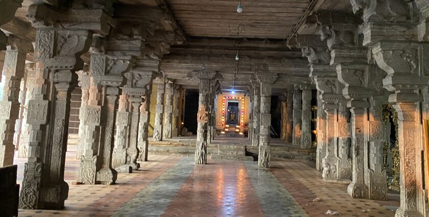 Thiruvaiyaru Temple halls with grand, carved pillars and ancient stone structures.