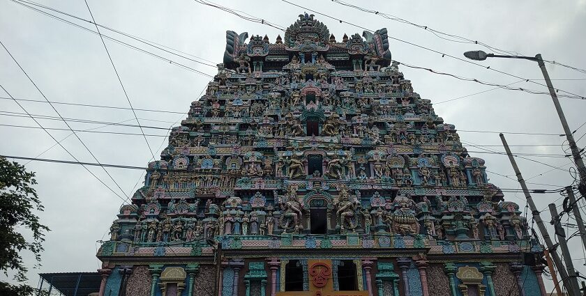 The Jambukeswarar Akilandeswari Temple shows a sign board and beautifully sculpted exterior