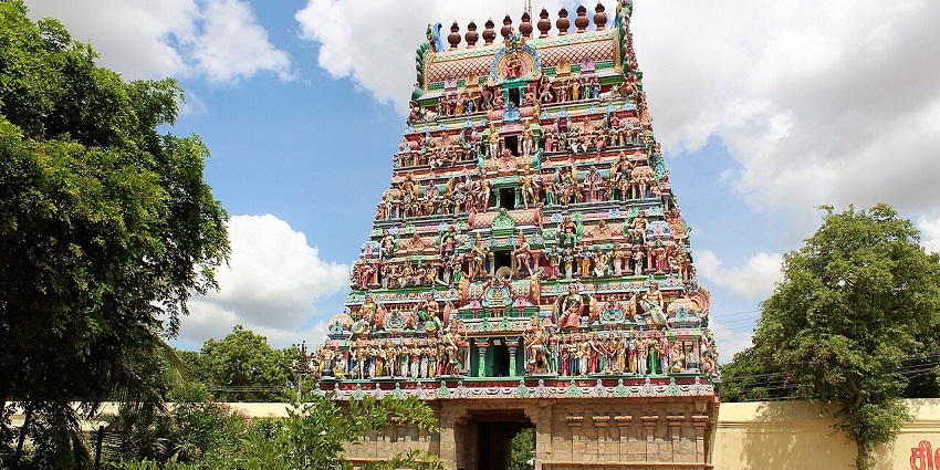 Seven-tiered gopuram, sacred tanks, and shrines dedicated to Shiva as Budhan Sthalam in historic Thiruvenkadu village.