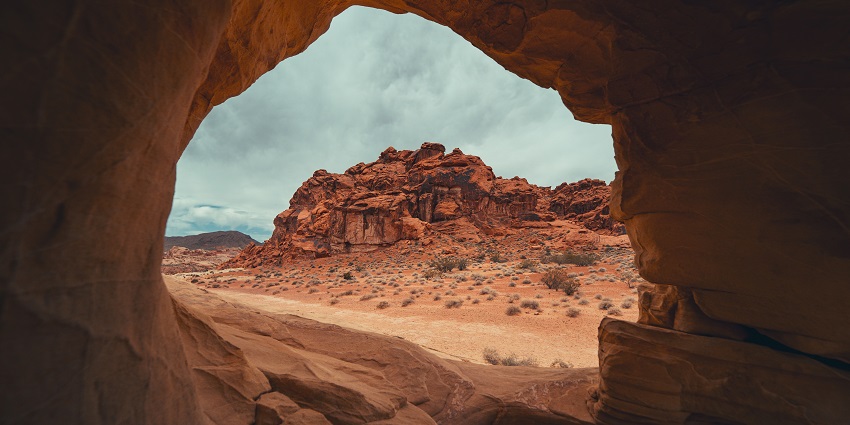 An image of the Tiger Cave ancient rock-cut with its scenic coastal backdrop.
