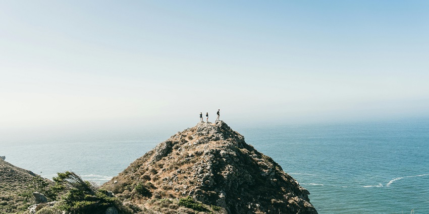 An image showing the people standing in awe at a cliff viewpoint like Tipperary Viewpoint.