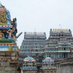 Colourful, intricate architecture of Tiruvottiyur Temple with detailed carvings and statues