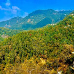 Trekking in Mussoorie offers breathtaking landscapes, crisp air, and adventure.