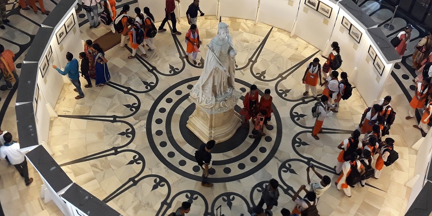 Interior view of a museum, showcasing various exhibits and a spacious layout.