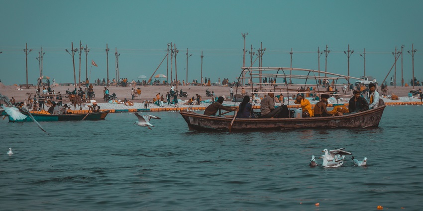 A glimpse of pilgrims travelling in a boat at Triveni Sangam near Allahabad Museum.