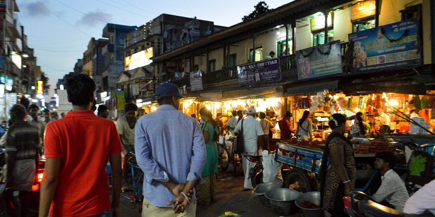 A picture capturing the beauty of George Town, Tamil Nadu with the shores, and clear water.