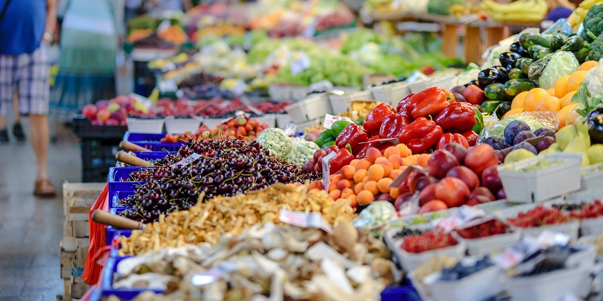 Local farmer's market offering fresh fruits, vegetables, produce and daily essentials.