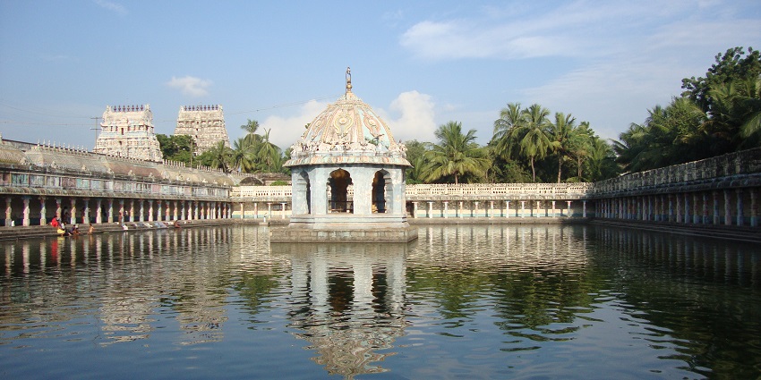 Panoramic view of the pristine white Vaitheeswaran Koil temple from the sacred tank.
