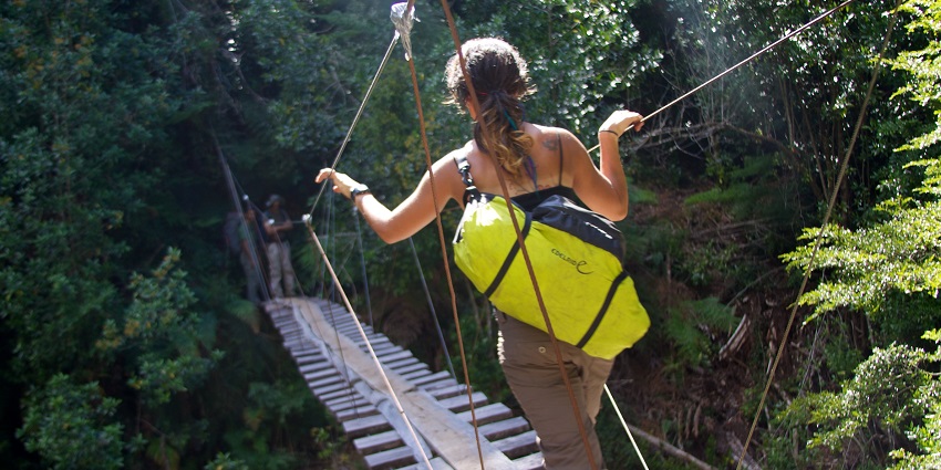 Adventure activity crossing valleys using ropes and harnesses.