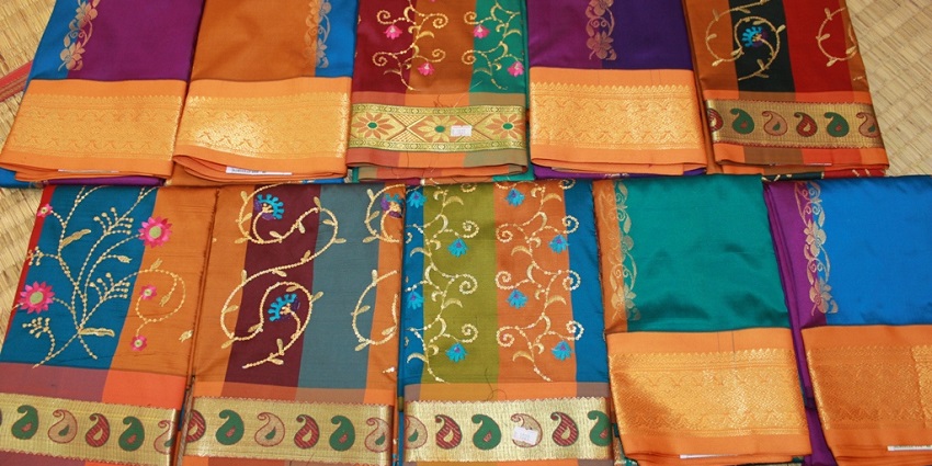 Intricate details on sarees at Vandana silks, a place for saree shopping in Varanasi