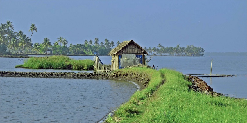 A picture of Veeran Puzha Beach, celebrated for its serene atmosphere and blue waters.