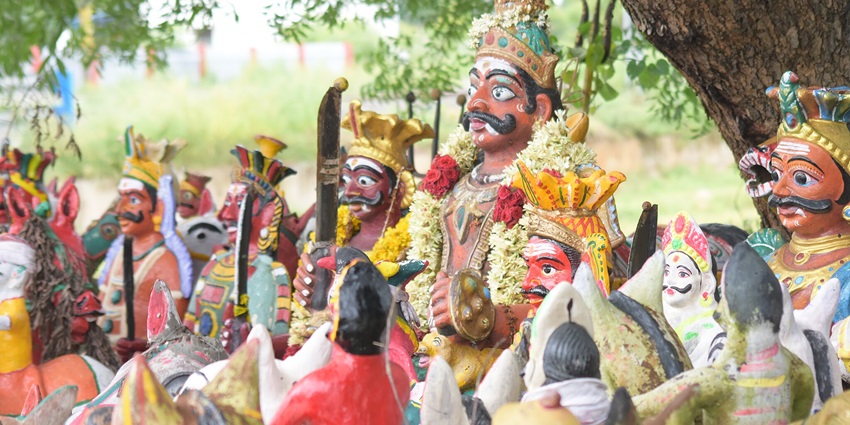 Colourful idols of various deities in an open temple in Villupuram in Tamil Nadu.