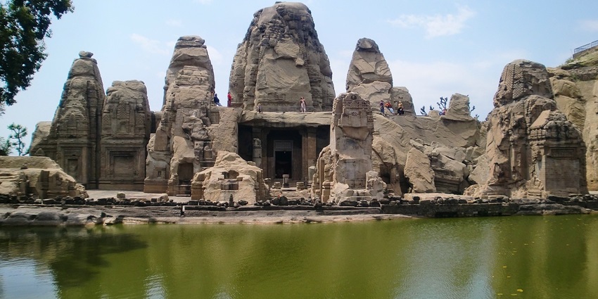 A view of an Ancient rock temple in India, showcasing stunning architecture and cultural history.