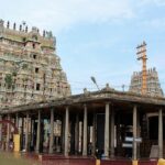 Virudhachalam Temple with intricate gopuram, pillared hall, and vibrant architecture.