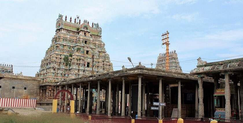 Virudhachalam Temple with intricate gopuram, pillared hall, and vibrant architecture.