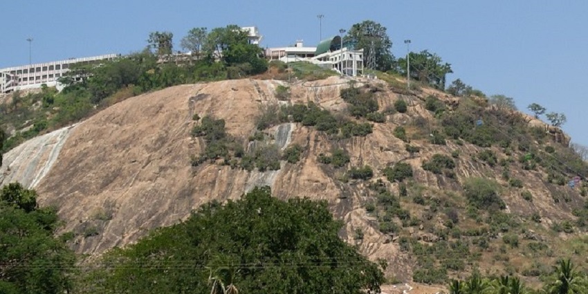 A picture of Idumban Hills featuring a famous temple, perfect for pilgrims and tourists.