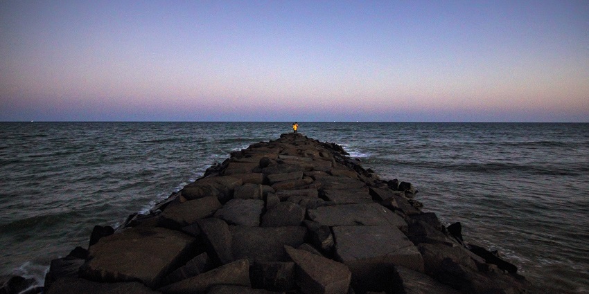 Evening at Serenity Beach in Pondicherry, perfect for relaxation and enjoying the calm waves at night.