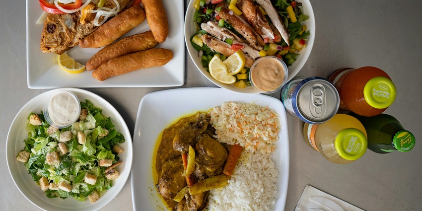 A Tamil Nadu thali with rice, curries, papad, and various side dishes on a banana leaf.