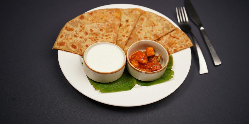 A traditional Indian thali served at a local eatery near Dudhwa National Park.
