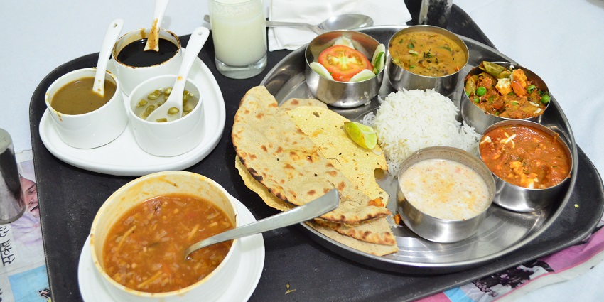 Dining near Kalpeshwar Temple features authentic Uttarakhand cuisine and ambience.