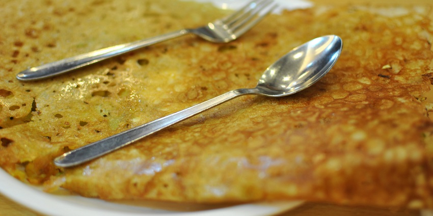 An image showing local traditional food served in the restaurants near Siruvani Waterfalls.