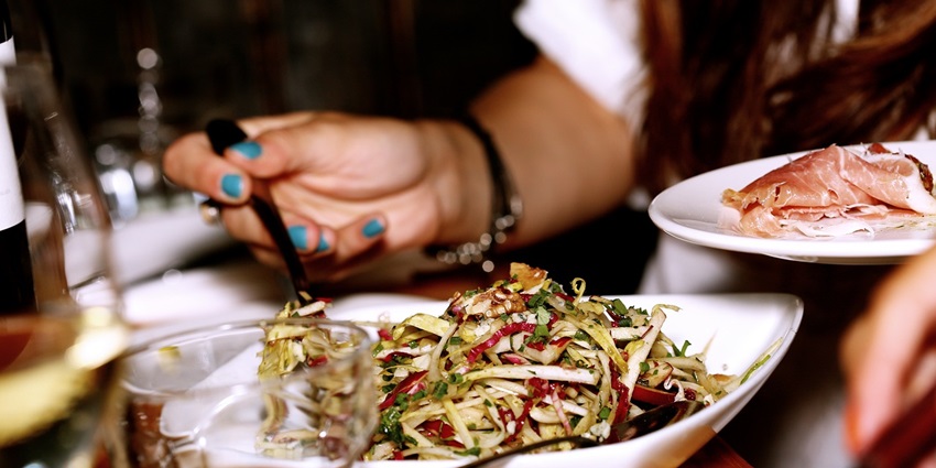 Colourful salad served in a restaurant, featuring fresh ingredients and vibrant presentation