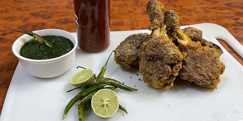 A beautifully cooked homemade fried chicken dish, showcasing Lucknow's favourite dish.