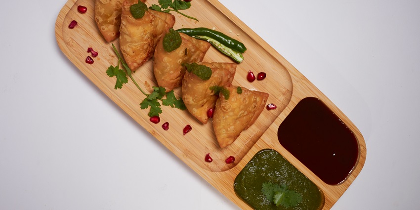 Enjoy delicacies like samosas at the restaurants near the Sohagi Barwa Wildlife Sanctuary