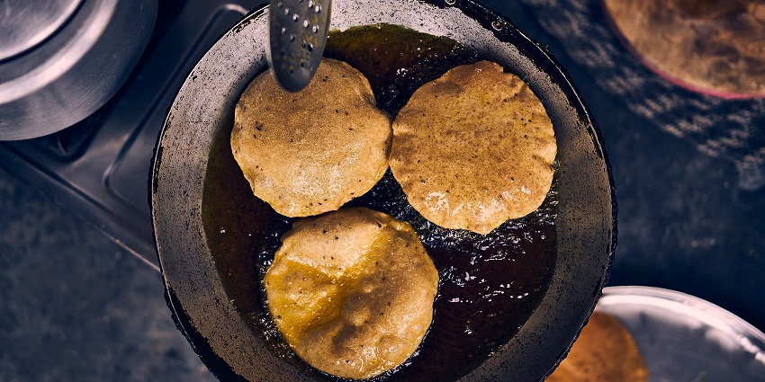 Chopta dining offers authentic Garhwali cuisine, including phaanu and kafuli.