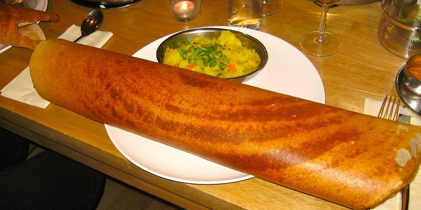 A plate of masala dosa served at a restaurant nearby