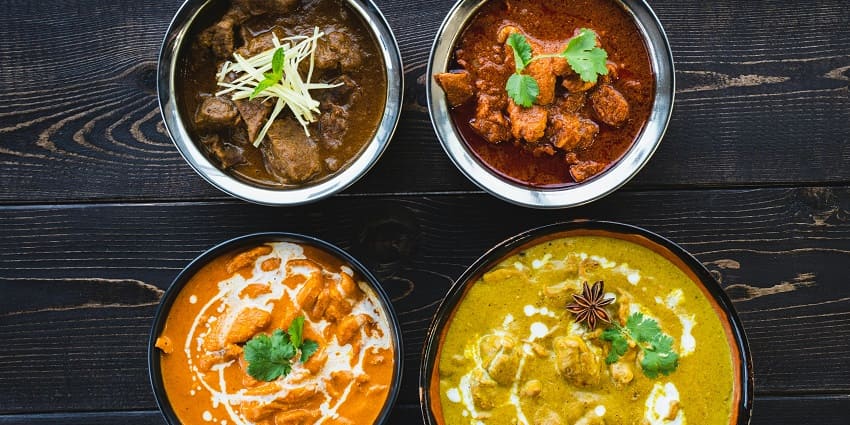 Image of different curries served at a restaurant near the Krishnabai temple