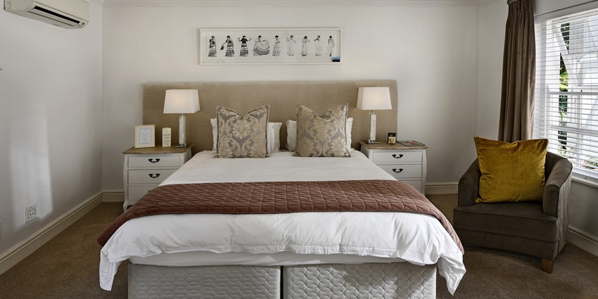 Image of a modern bedroom interior design featuring stylish decor and cosy furnishings