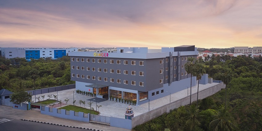 The Ginger Hotel in Chennai with modern architecture and dining facilities.