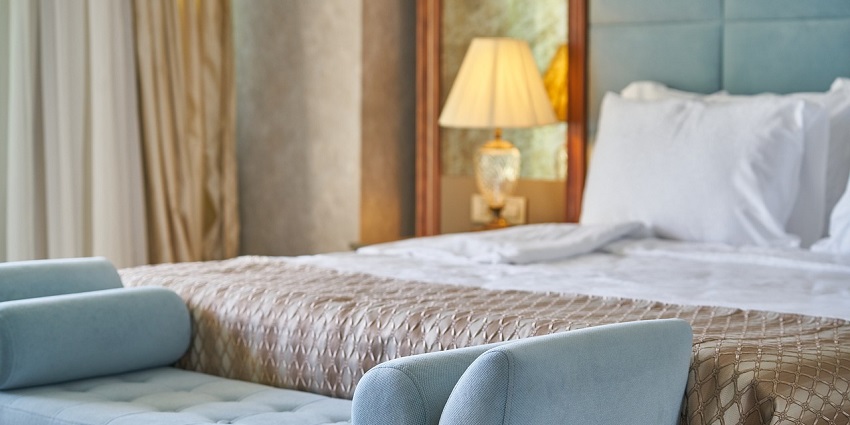 A picture of a hotel room with all the basic amenities for tourists