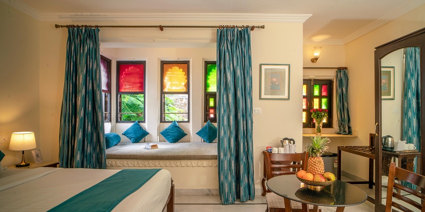 An image showing a luxurious hotel room interior showcasing modern design