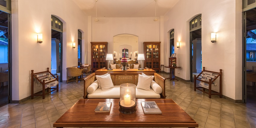Luxury reception lounge near Karamadai Temple with elegant furnishings and soft lighting.