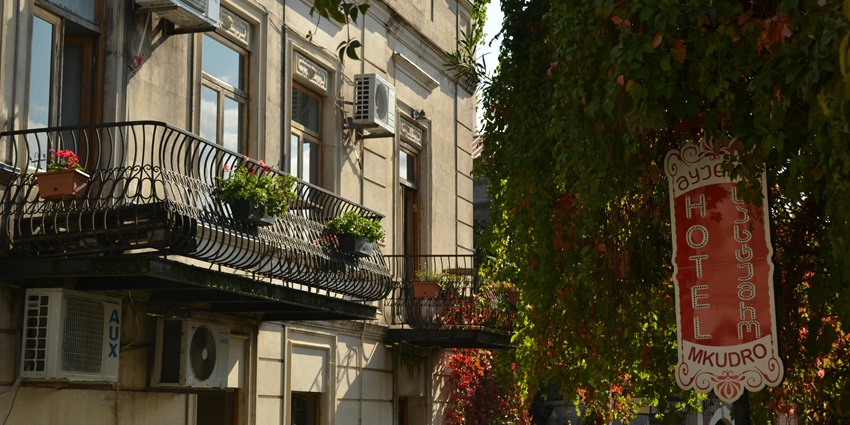 Facade of a hotel in Turkey with a modern architectural design and multiple balconies