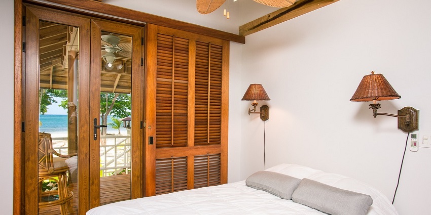 Elegant hotel room showcasing stylish bedroom interior with modern furnishings.
