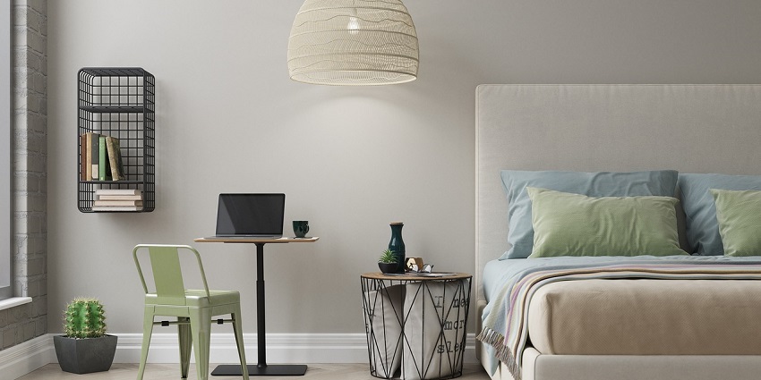 Modern bedroom showcasing a stylish bed and contemporary interior design elements