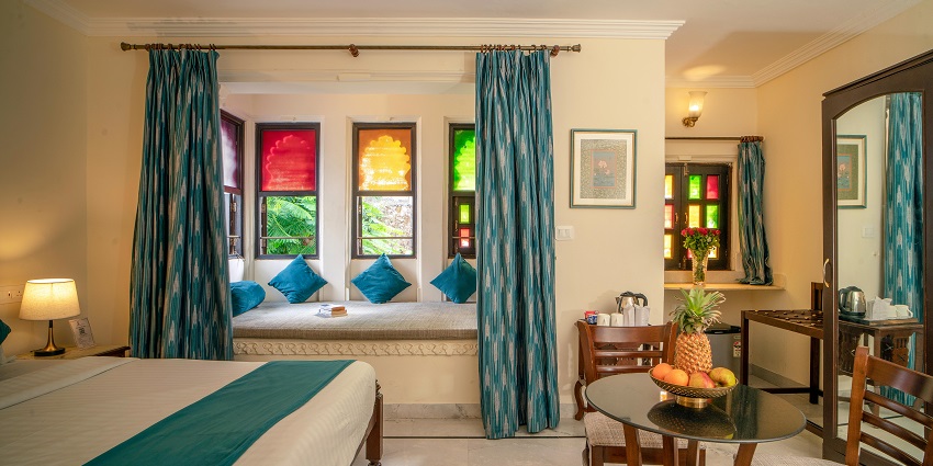 An image showing a luxurious hotel room interior showcasing modern design and comfort
