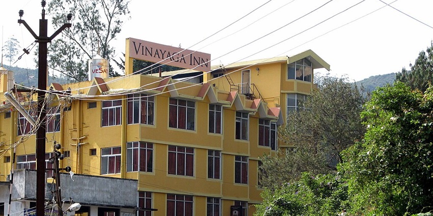 An image of a hotel room, an accommodation near the sacred Thirukalukundram Temple.