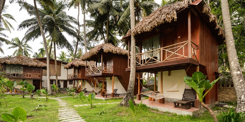 Accommodation options near Jim Corbett offer comfort, nature-inspired decor uttarakhand.