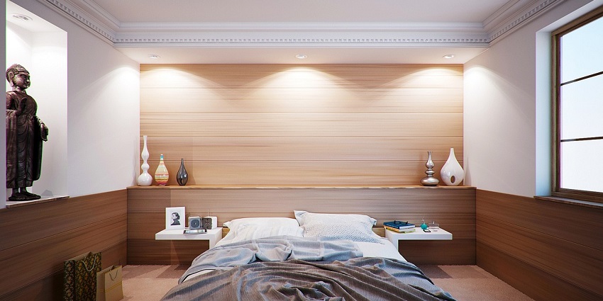 Bedroom of a hotel resembling the stay facility of a hotel near Thirumoorthy Waterfalls.