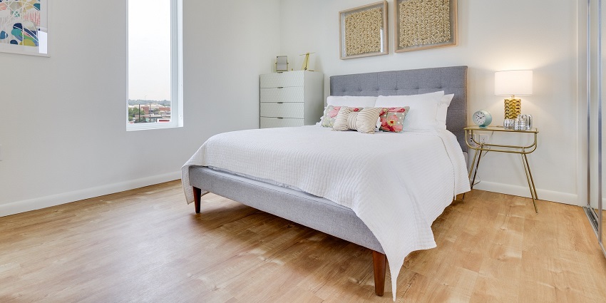 Hotel interior with modern furnishings, elegant lighting, and a warm colour palette.
