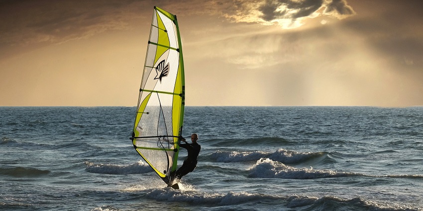 An adventurer windsurfing view of one of the most popular Dandi Beach water sports.