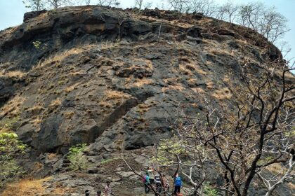 Mrugagad Fort, a tourist attraction near Maharashtra, stands atop rugged hills amid nature.